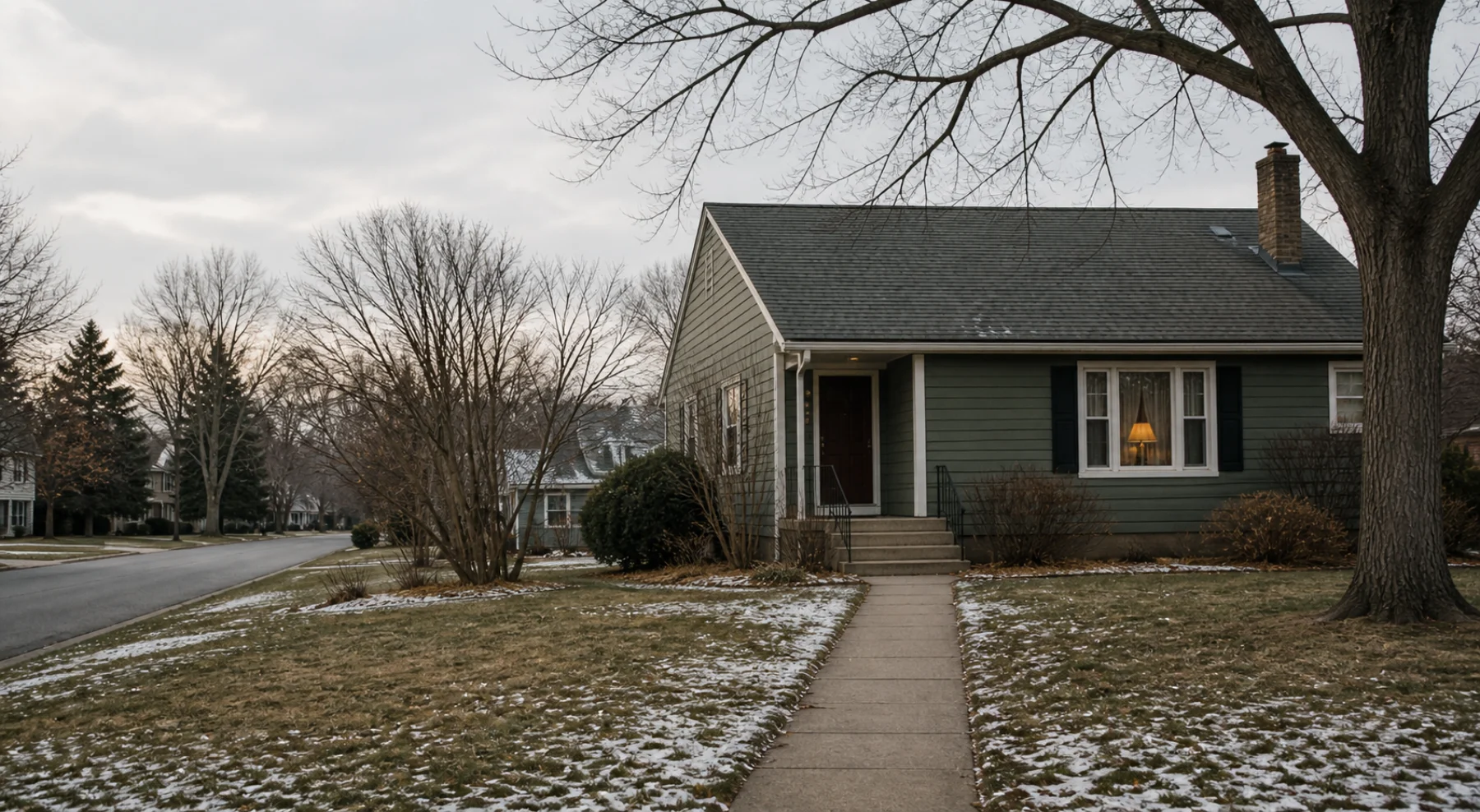 A modest home in an established neighborhood at the beginning of winter